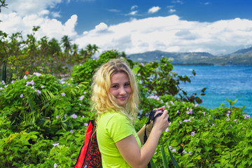 Portrait of Young pretty girl in Dominican Republic on background of amazing tropical nature