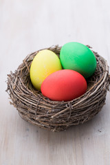 Easter eggs in the nest. Spring discount card.