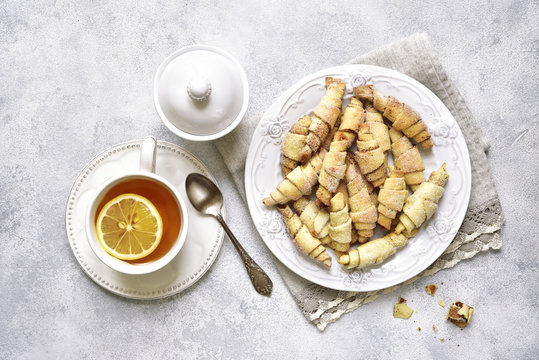 Cinnamon cookies and cup of tea for a breakfast.Top view.