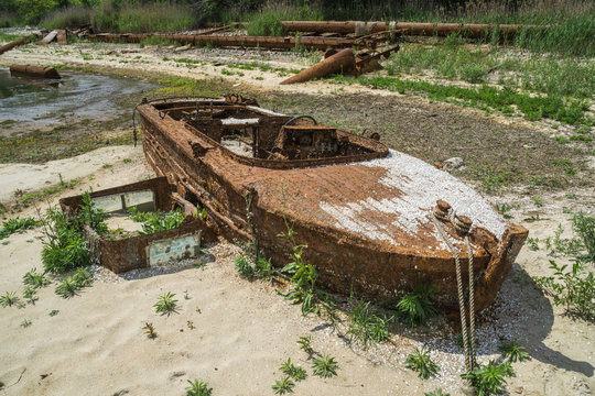 old boat near former radio-ecological laboratory (fish farm before accident) in Pripyat, Chernobyl Exclusion Zone, Ukraine 