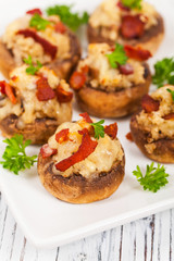 Bacon Stuffed Mushrooms with Breadcrumbs and Cheese. Selective focus.