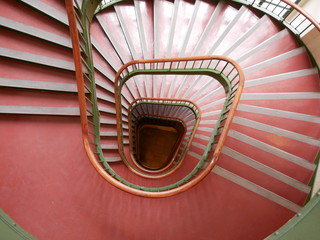 Spiral red staircase viewed from above