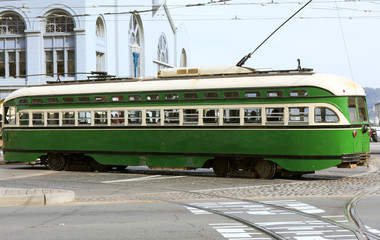 Vintage green and yellow San Francisco streetcar.