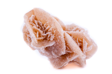 Macro mineral stone Rose winds on a white background