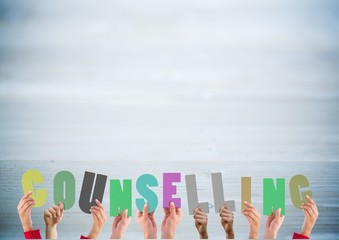 Hands holding alphabet of counselling