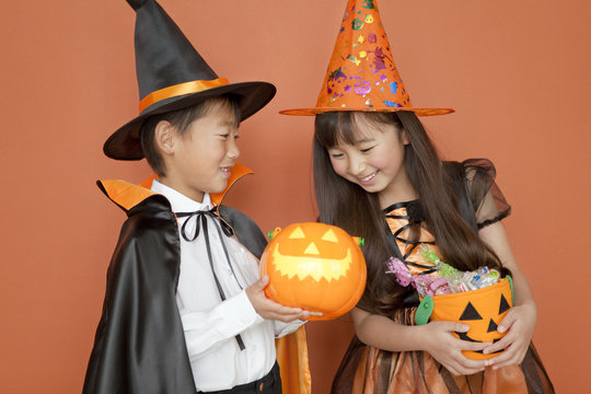 Boy and girl dressed for halloween