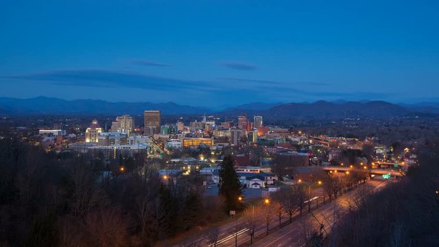 Asheville City Skyline Early Morning Dawn Landscape Timelapse with Blue Ridge Mountain Layers in the Background and Passing Interstate Traffic in the Foreground