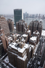 Looking down at snow covered roofs in Manhattan after snowstorm Stella - 140853815