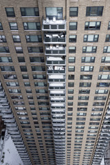 Column of snow covered balconies on Manhattan high-rise after snowstorm Stella - 140853828