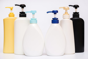 Bottles of cosmetics collection on white background