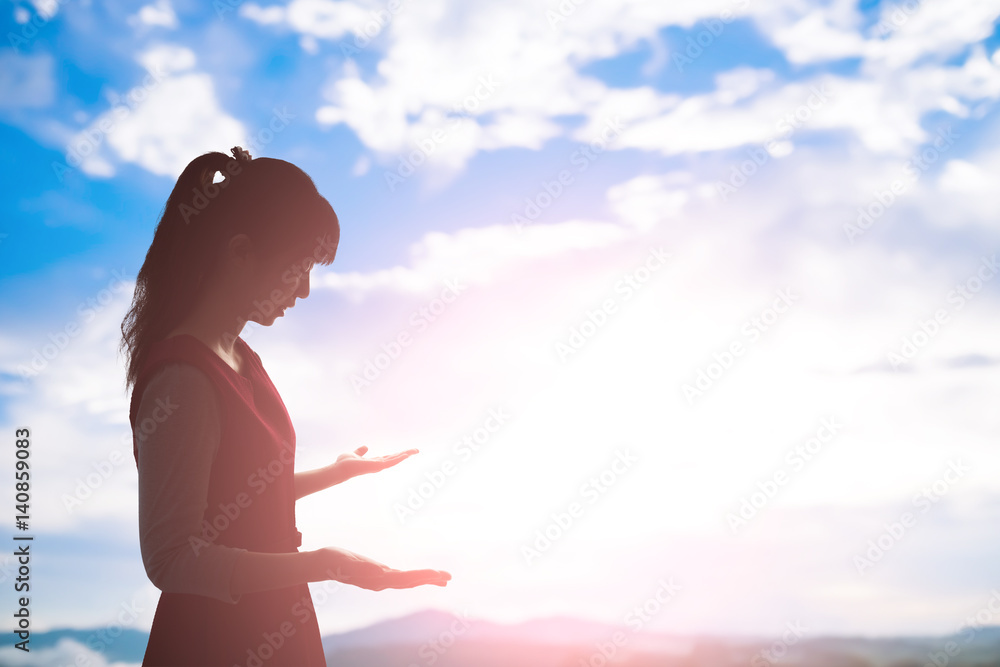 Wall mural woman pray pious