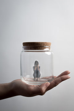 woman sit in jar