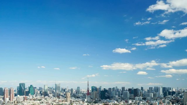 4k 東京タイムラプス　昼　都心全景　青空に流れる雲　東京タワー　大空コピースペース