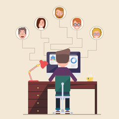 A man sits at a computer and looks at different candidates.