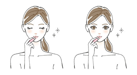 リップを塗る30代前後の女性