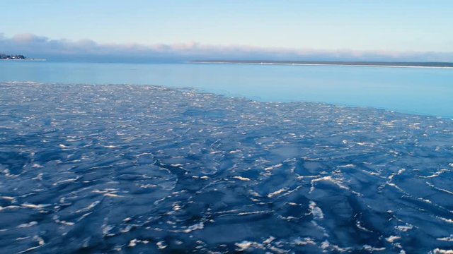 13052_Aerial_and_closer_view_of_the_blue_sea_in_Kasmu.mov