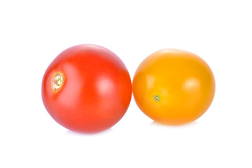 fresh red and yellow cherry tomato on white background