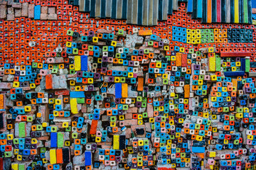 Multicolor bricks, exterior wall as background