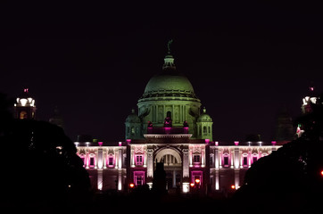 Fototapeta na wymiar Victoria Memorial Hall, Kolkata, India in a night. The building is located at the heart of city Kolkata.For other memorials to Queen Victoria and is now a museum. It was built between 1906 and 1921.
