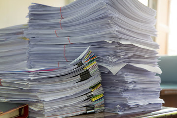 Business Concept, Pile of unfinished documents on office desk, Stack of business paper