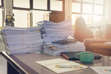 Business Concept, Pile of unfinished documents on office desk, Stack of business paper,Vintage Effect