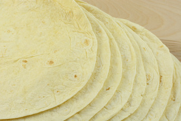 Close up of flour tortillas stacked up together