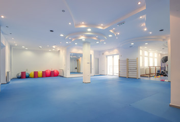 interior large room, no people, fitness gym physical therapy