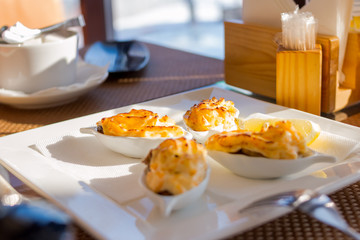 Baked mussels. Delicious seafood, New Zealand mussels baked with cheese  and lemon