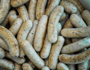 Background of germany sausage stack on dish in Hotel buffe