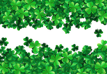 Fototapeta na wymiar Saint Patricks day background with sprayed green clover leaves or shamrocks