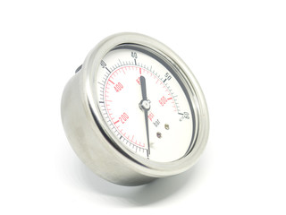 Closeup of a high pressure manometer on white background.