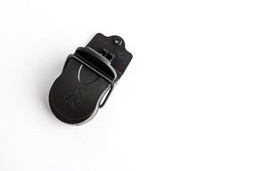 Mousetrap black in plastic and metal on a white background