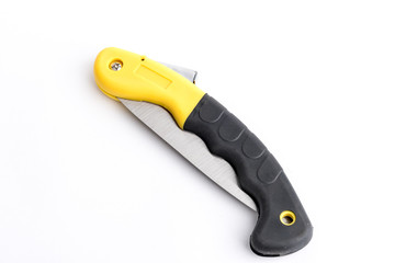 Folding garden hacksaw black-yellow saw on white background, saw with handle lock