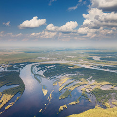 Fototapeta na wymiar Forest river in spring, top view