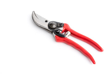 Red garden pruner on the white background