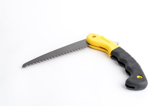 Folding garden hacksaw black-yellow saw on white background, saw with handle lock