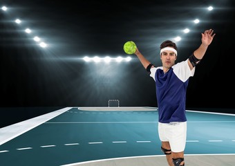 Player playing handball in stadium