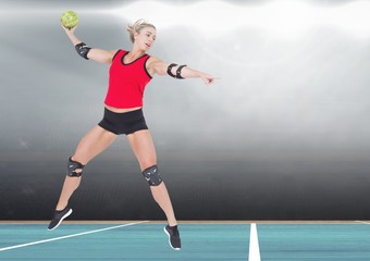 Player playing handball in stadium