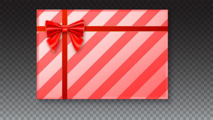 Obraz premium Gift box with big red bow and ribbon, isolated on transparent background. Top view on gift packaged in a paper with pattern