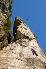 Man rock climbing on Ontario's Niagara Escarpment in Canada