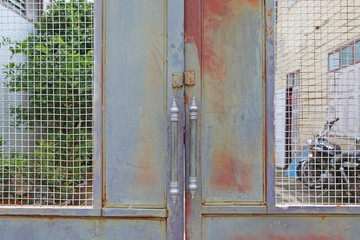 old and rusty iron gate