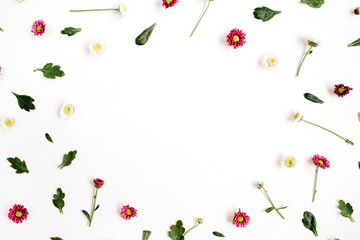 Frame wreath with red and white wildflowers, green leaves, branches on white background. Flat lay, top view. Flower background.