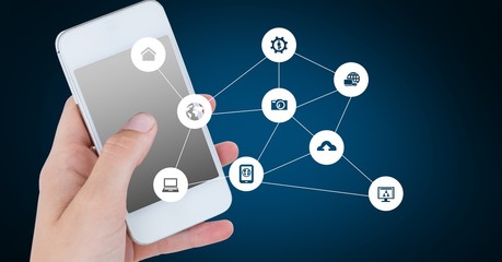 Hand of woman using mobile phone with connecting icons