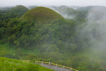 Foggy view of Chocolates hills from an observation deck - Bohol, Philippines
