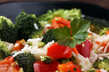 Colorful rice and vegetable salad - fresh mixed colorful healthy vegetarian food