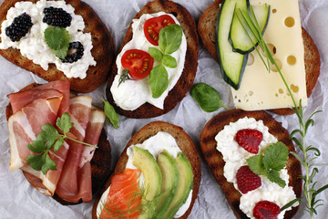 Bread Brushetta or authentic traditional spanish tapas set for lunch table. Sharing antipasti on...