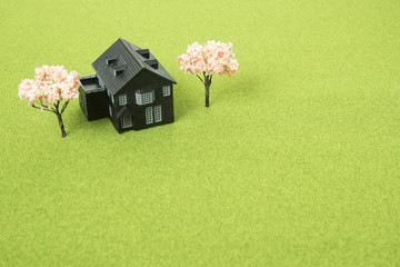 住宅と桜の木の模型
