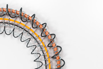 Concentric shape made of rings and spirals on white background