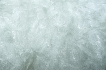 Frozen water in lake closeup