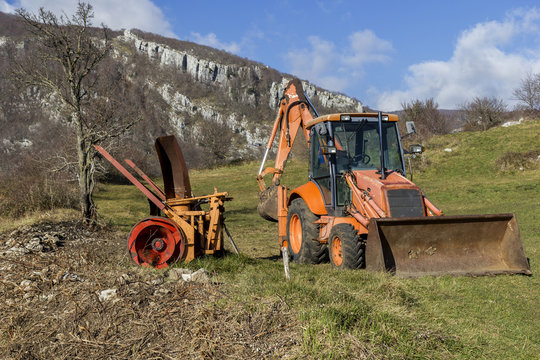 agricultural machinery in mountain scenary